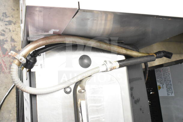 Schaerer Barista 2 Group Espresso Machine with 2 hoppers, 2 steam wands, visible hoses, in used condition.