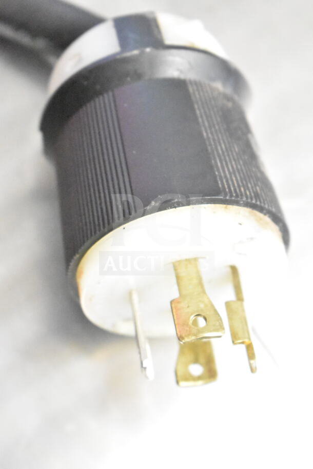 Bunn IMIX-5 cappuccino machine power plug, showing 120/208-240 volts compatibility, close-up view.