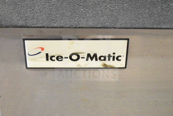Ice-O-Matic ICE0400HWI Commercial Ice Machine on B40PSA Bin, used condition, 115V, 1 phase, brand label visible.
