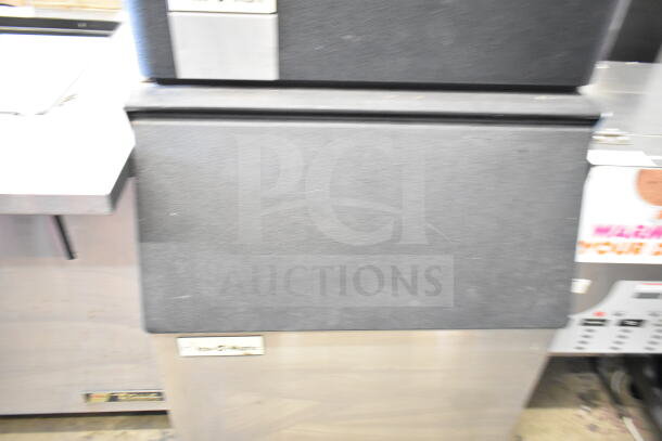 Ice-O-Matic ICE0400HWI ice machine head on B40PSA bin. 115V, 1 phase. Commercial use, sturdy design, visible branding.