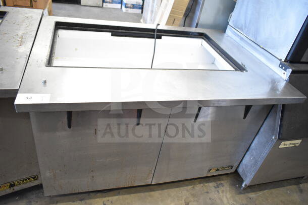 True TSSU-48-18M-B commercial prep table, missing lid, 115 volts, 1 phase, visible wear, labeling at the base.