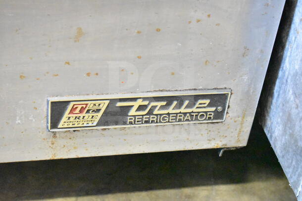 True TSSU-48-18M-B commercial prep table, missing lid, 115V, 1 phase. True logo plate visible on front panel.