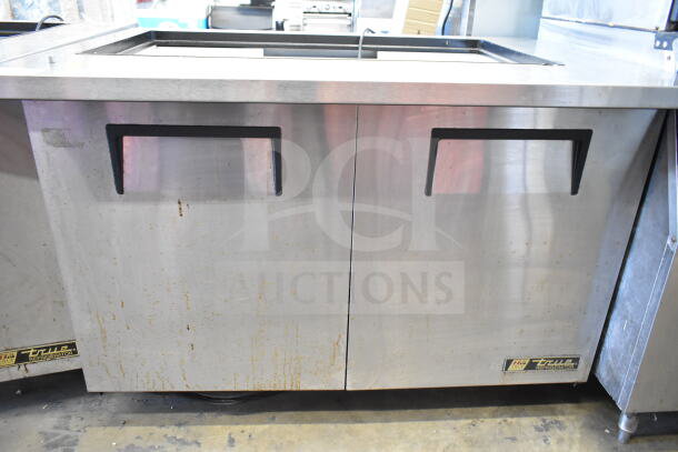 True TSSU-48-18M-B commercial prep table, missing lid, stainless steel, used condition, 115 volts, 1 phase.