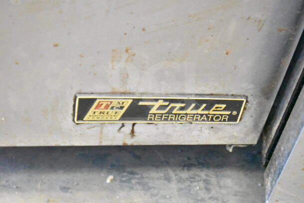 True TSSU-48-18M-B Commercial Prep Table, missing lid, 115V, 1 phase, features True branding and identifiable model label.