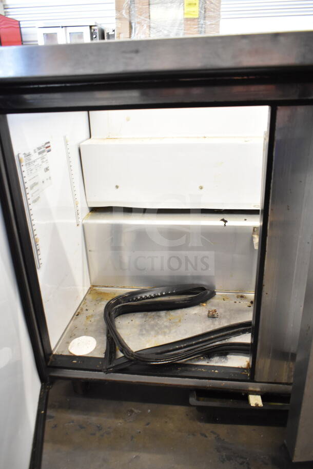True TSSU-48-18M-B commercial prep table, missing lid, shows interior labels, 115V, 1 phase. Used condition.