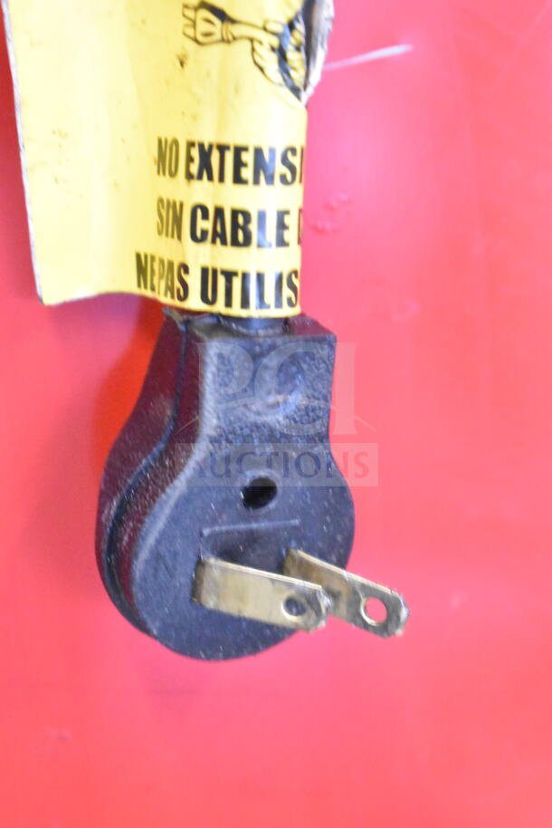 Imbera VR09 commercial cooler power plug with yellow warning label advising not to use extension cables.