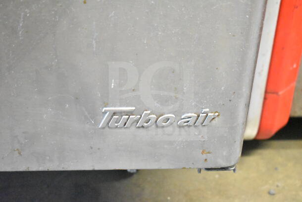 Turbo Air TST-72SD-30-N prep table with visible logo, stainless steel, 115V, 1 phase, commercial use, some wear.