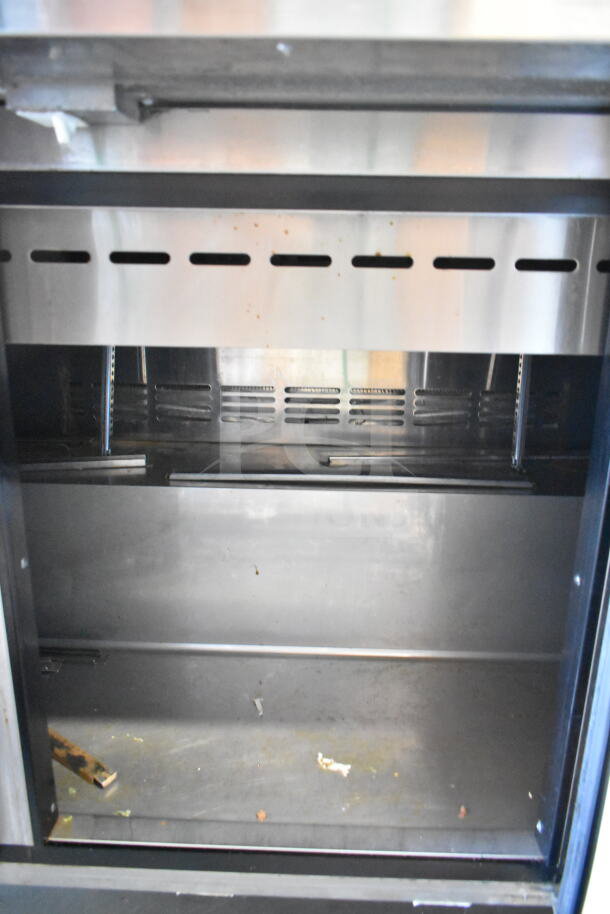 Turbo Air TST-72SD-30-N prep table interior, stainless steel, visible shelving, used condition. 115 Volts, 1 Phase.