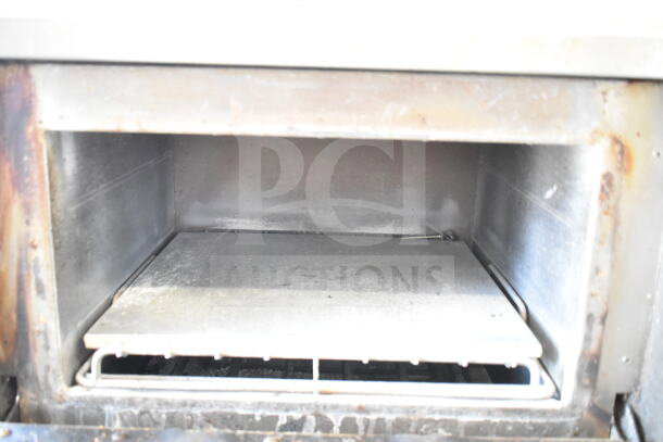 Turbochef NGC Rapid Cook Oven interior, showing metal cooking chamber with some wear. 208/240V, 1 Phase, electric.