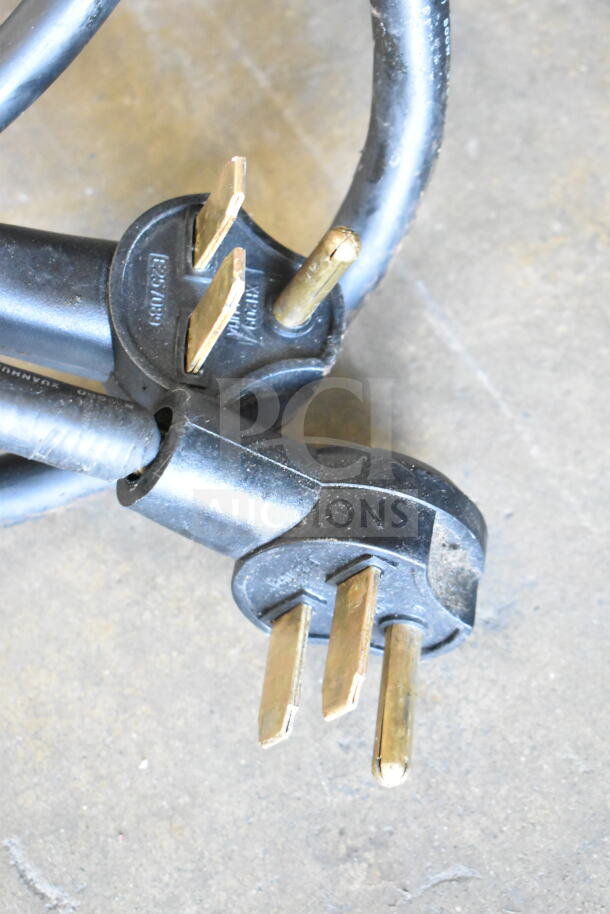 Close-up of electrical plugs for Turbochef NGC commercial rapid cook ovens, showing robust connectors.