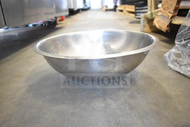 Aluminum mixing bowl, slightly worn, part of a lot including ladles and poly drop-in bin, auctioned 57 times your bid.