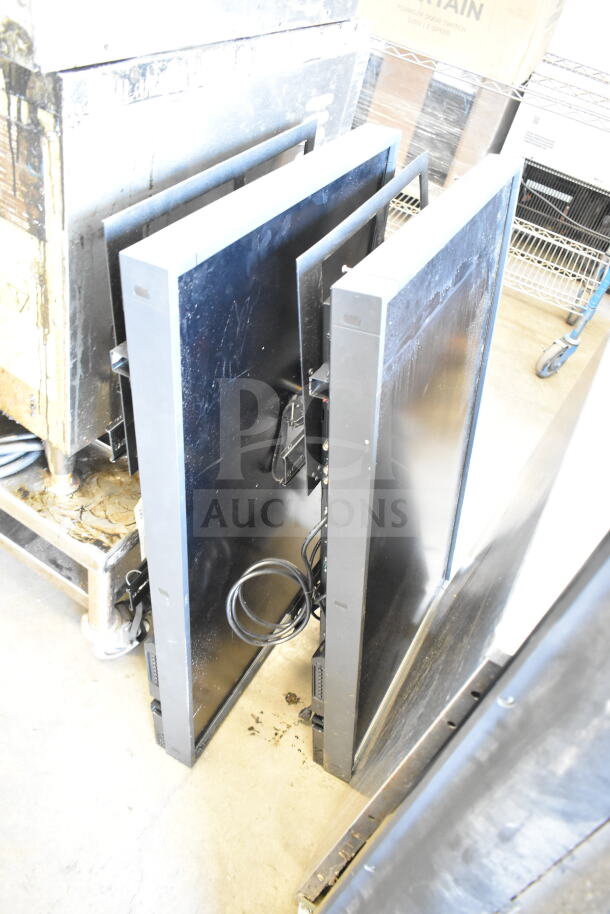 Three various televisions including Samsung UN50EH5300F and NEC MultiSync P402, standing vertically, pickup only.