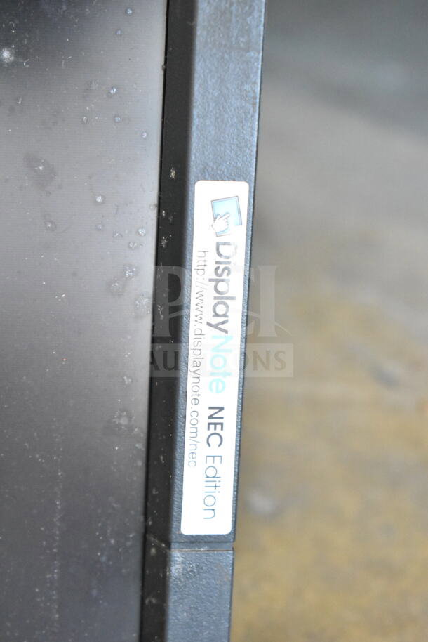 "NEC MultiSync P402 display corner with DisplayNote NEC Edition label, offering advanced presentation features. Physical condition suggests prior usage."