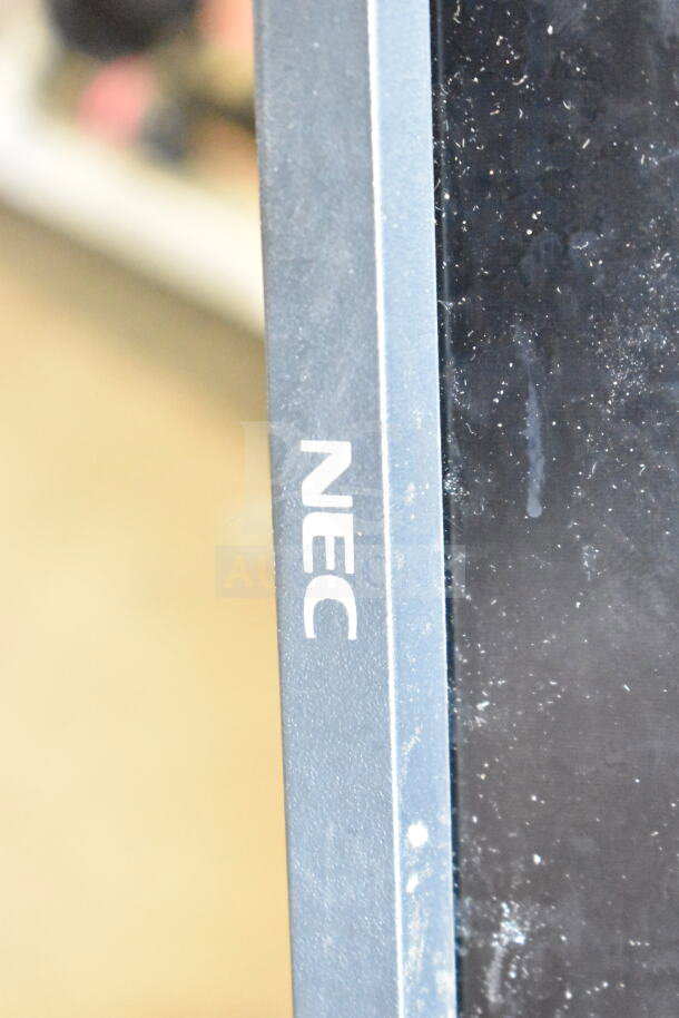 NEC MultiSync P402 TV with visible branding. Screen shows dust and wear. Appears part of a mixed TV auction lot.