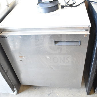 Delfield 406CA-DHL-DD1 single door undercounter cooler, 115 volts, stainless steel, commercial use, visible wear.