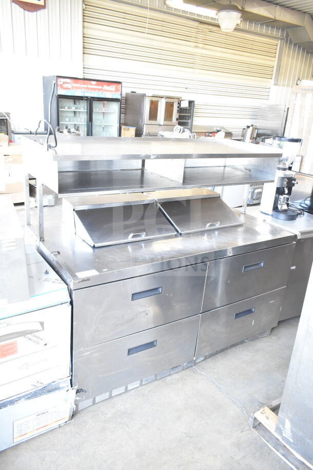 Delfield commercial sandwich salad prep table with four drawers, overhead shelf, and Bain Marie mega top. 115 volts, 1 phase.