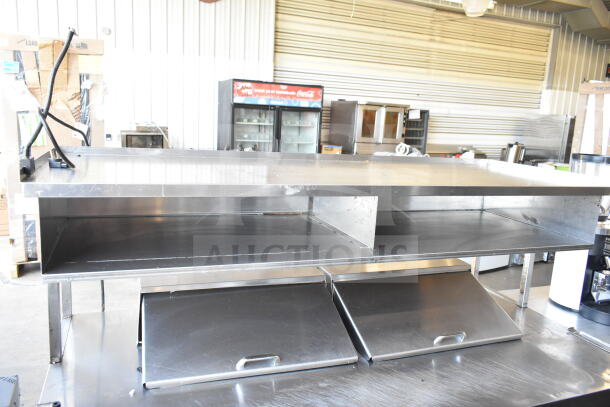 Delfield commercial sandwich salad prep table with Bain Marie mega top, four drawers, and over shelf. 115 Volts, 1 Phase.