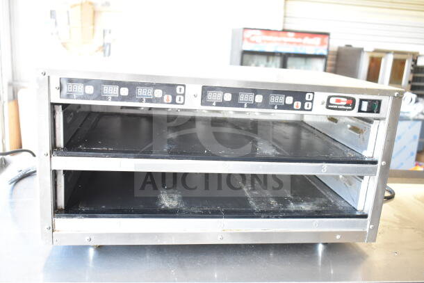 Carter Hoffmann MC212S2-2DD, 2-tier warming display, 120V, 1 phase, countertop, digital controls, stainless steel, used condition.