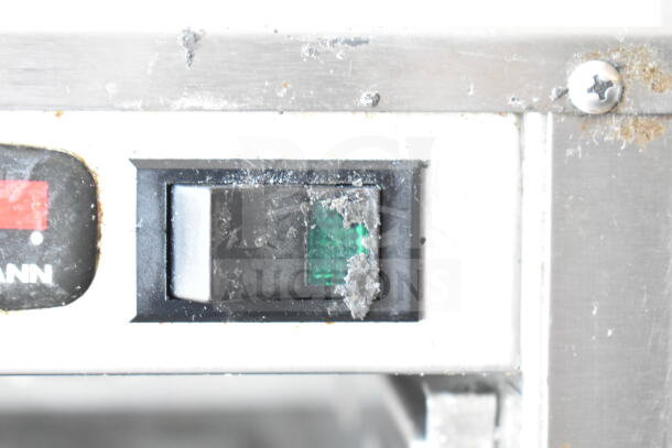 Carter Hoffmann MC212S2-2DD warming display, switch close-up, showing dust and wear.