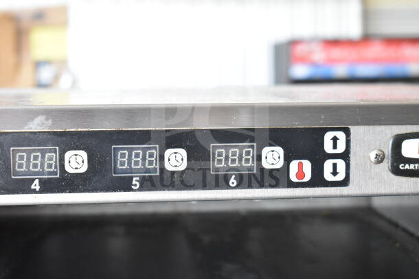 Carter Hoffmann MC212S2-2DD warming display control panel showing digital temperature settings and timers.