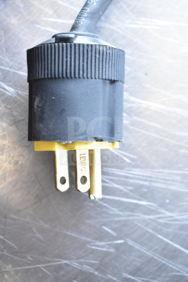 Close-up of a three-prong plug for Carter Hoffmann MC212S2-2DD warming display, 120 volts, 1 phase.