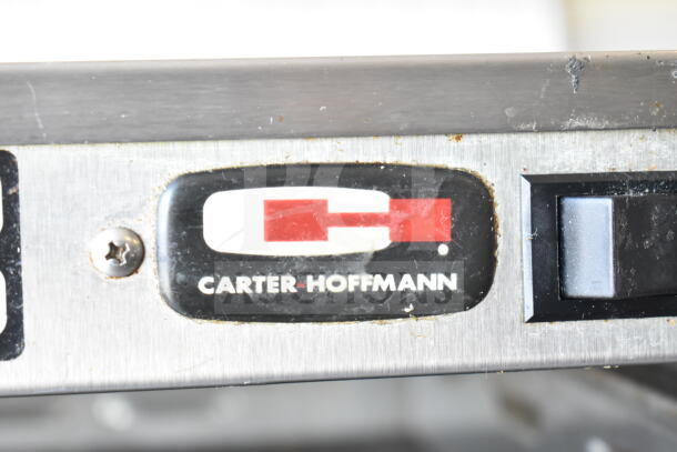 Carter Hoffmann MC212S2-2DD warming display close-up showing logo. Slight wear visible on stainless steel surface.
