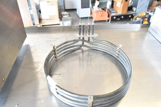 HPM236108K Moffat M236108K Element Assy 208v in good condition. Metal coil design with four connector prongs.