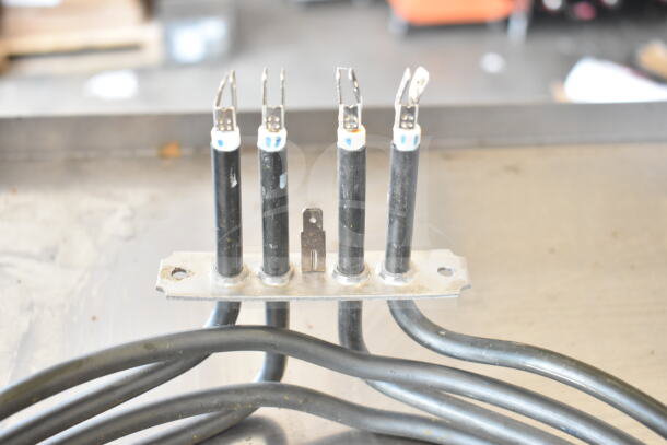 A collection of 5 items including HPM236108K Moffat M236108K Element Assembly, featuring metal terminals and black cords, displayed on a metallic surface.