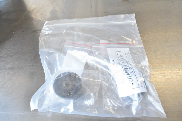Plastic bag containing Avantco 177101101464 gas control knob for VB200 series broilers, sealed with label detailing part info.