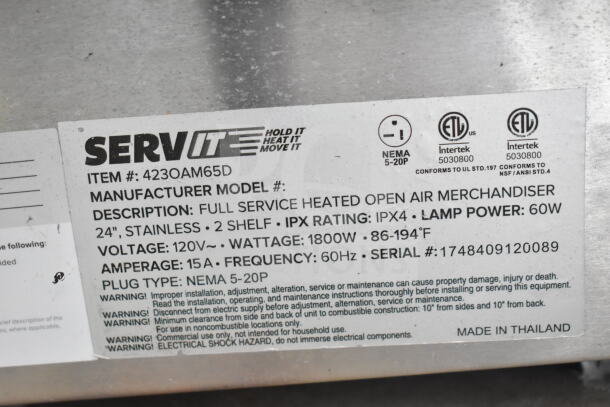 ServIt 423OAM65D heated display label, showing specs: 24", stainless, 2 shelves, 120V, 1800W, IPX4, NEMA 5-20P plug.
