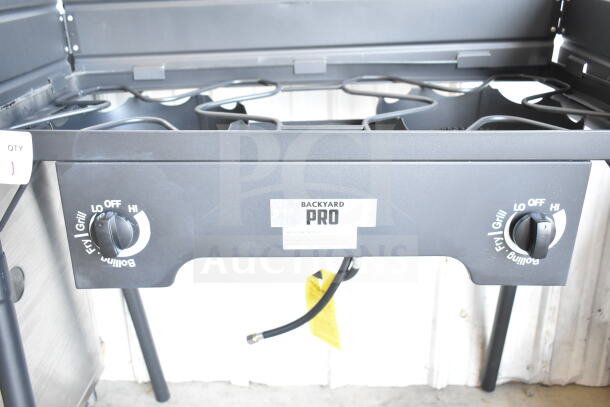 BRAND NEW Backyard Pro BPSQ-212 double burner stove, 110,000 BTU, with side shelves. Scratch and dent condition.