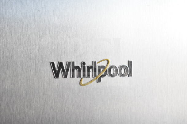 Brand new Whirlpool WRSC6536RZ00 cooler and freezer, 115V, 1 phase. Scratch and dent condition. Whirlpool logo visible.