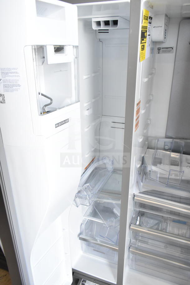 Brand new Whirlpool WRSC6536RZ00 reach-in cooler/freezer, 115V, 1 phase, scratch and dent, interior view.