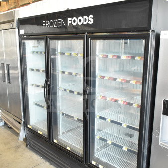 2017 True GDM-72F-HC commercial freezer, 3 glass doors, black exterior, clean interior shelves, 115/208-230V, 1 Phase.