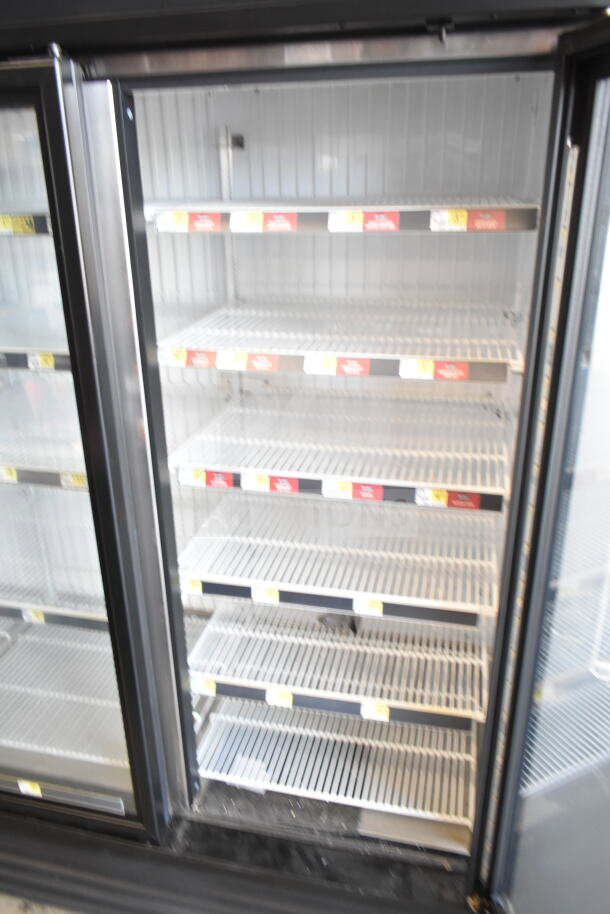 2017 True GDM-72F-HC commercial 3-door reach-in freezer, excellent condition, adjustable shelved interior.