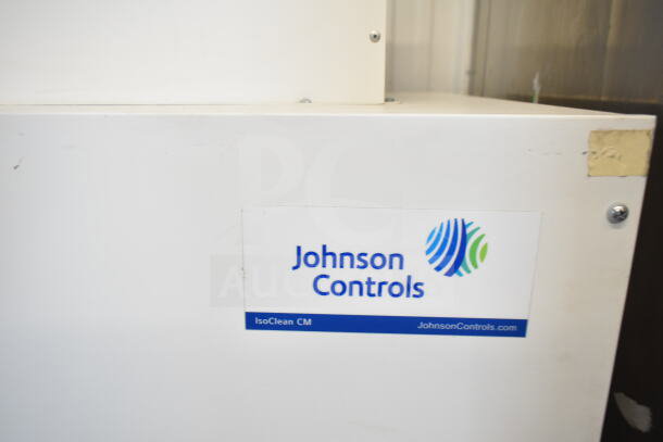 Johnson Controls Isoclean CM commercial air filter, 120V, 1 phase, features brand label and website link on the unit's exterior.