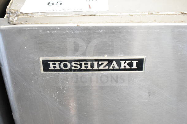 Hoshizaki KM-900MRH Commercial Ice Machine Head, 208-230V, scratches on stainless steel, visible branding.