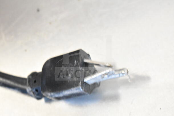 Alt text: Power plug attached to a Leader FR30 S/C cooler. 115 Volts, 1 Phase. Black casing, standard prongs.