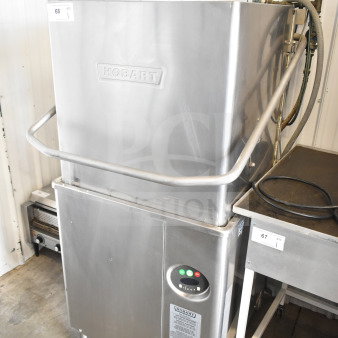 Hobart AM15 commercial dishwasher, stainless steel, corner pass through, 208-240V, 3 phase, visible control panel.