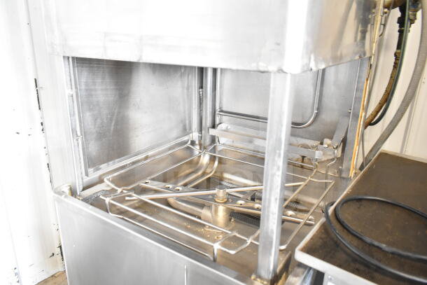 Hobart AM15 commercial corner pass through dishwasher, stainless steel, 208-240V, 3 Phase, good condition.