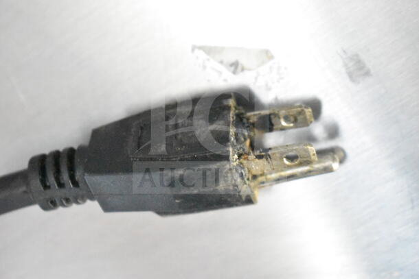 AvaToast CTA7001 commercial toaster oven power plug, showing wear, 120 volts, 1 phase.