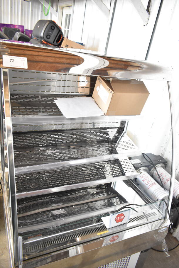 "Brand new KoolMore CDA-13C Grab & Go Merchandiser, 13.4 cu. ft., open air design, minor scratches, tags show model info."