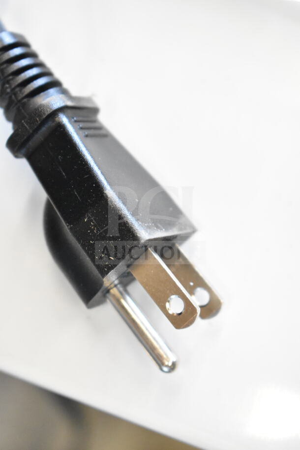 Close-up of electric plug for Galaxy 177RCGB3060 60 Cup Rice Cooker. Brand new, scratch and dent condition, 120V.