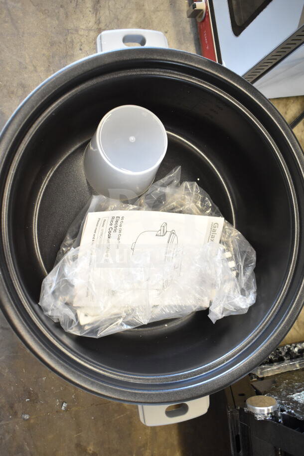 Brand new Galaxy 177RCGB3060 rice cooker, 60 cup capacity, electric, 120 volts, 1 phase. Includes manual and accessories.