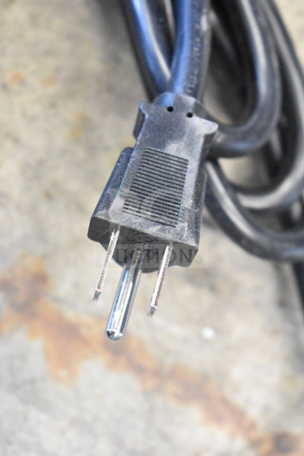 Close-up of a black electrical plug for the Avantco 177CO16 countertop convection oven, model detail not visible.