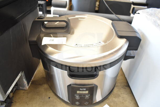 Brand new Avantco 177RCSB90 digital rice cooker, 90 cup capacity, hinged lid, minor cosmetic scratch, 240V, 1 phase.