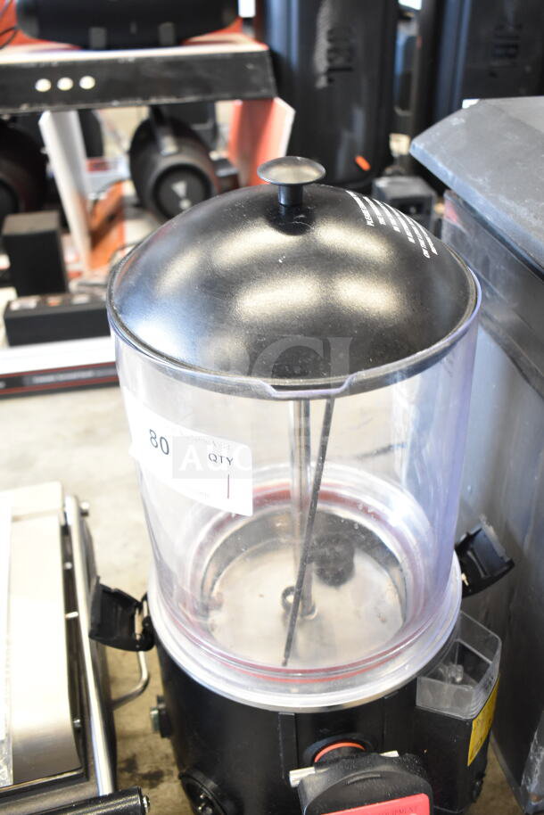 Avantco 177DHC26 2.6-gallon hot beverage dispenser, black top, clear tank, 120 volts, used condition, quantity tag visible.