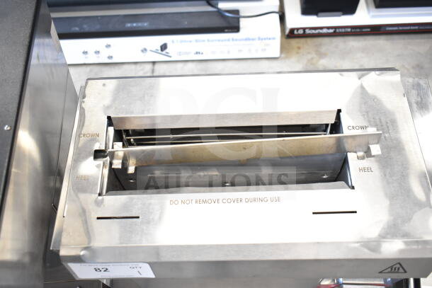 Avantco 177CPBTB66A Commercial Vertical Contact Bun Toaster, 120V, 1 Phase, labels for "crown" and "heel," durable finish.