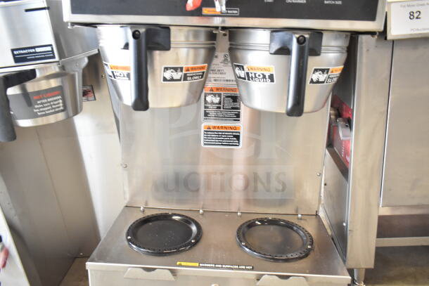 Bunn DUAL 20900.0011 coffee brewer, dual 18.9 gal capacity, stainless steel, warning labels visible.