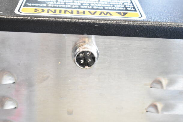 2026 Bunn DUAL 20900.0011 coffee brewer connector, stainless steel finish, warning label visible on the top.